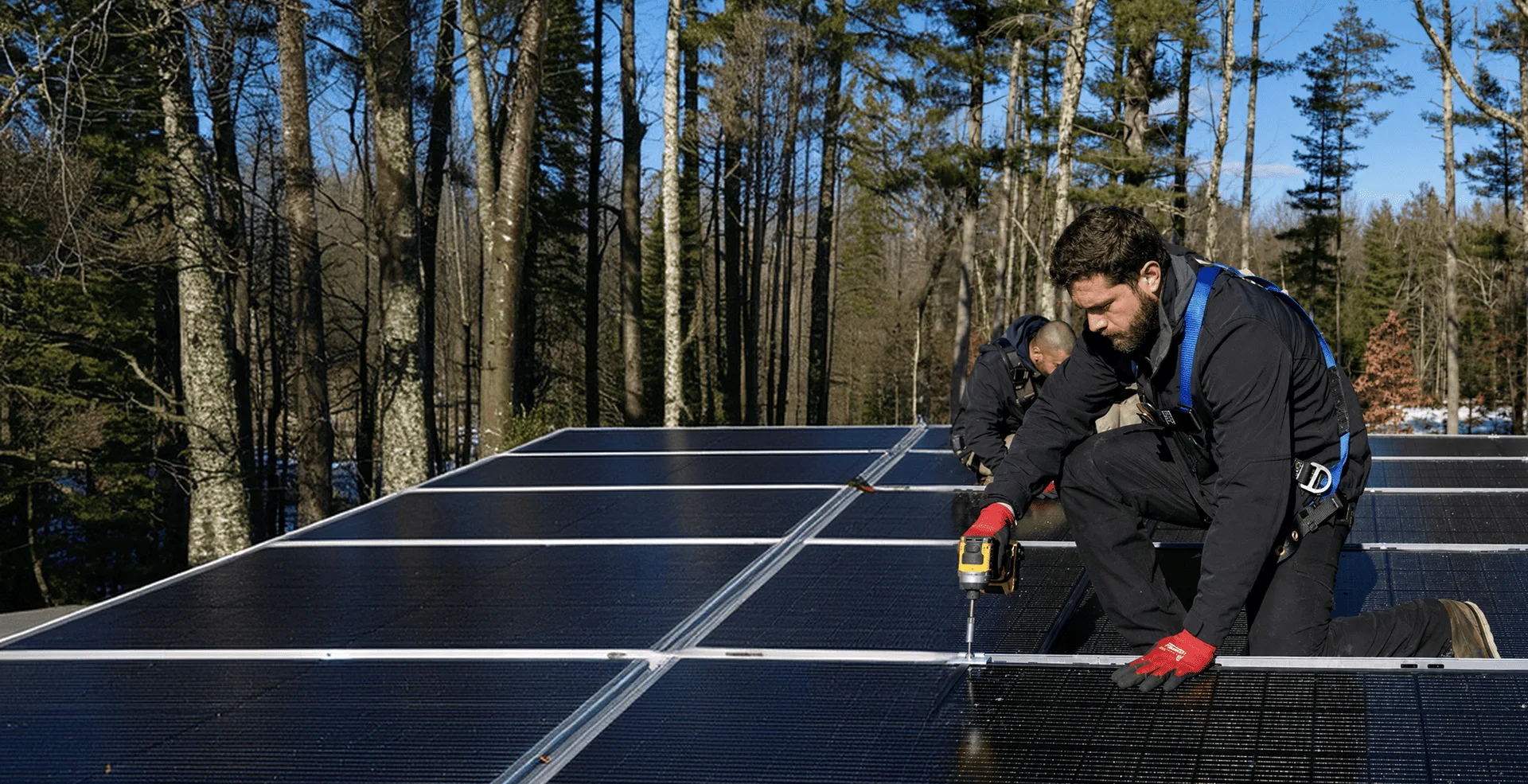 Technician inspecting a residential solar array